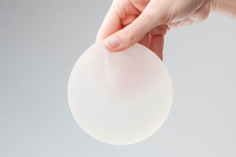Hand-And-Breast-Implant.jpg